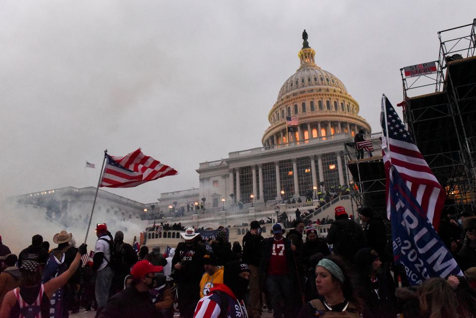 Police clear the U.S. Capitol Building with tear gas as supporters of U.S. President Donald Trump gather outside, in Washington, U.S. January 6, 2021. REUTERS/Stephanie Keith/File Photo

