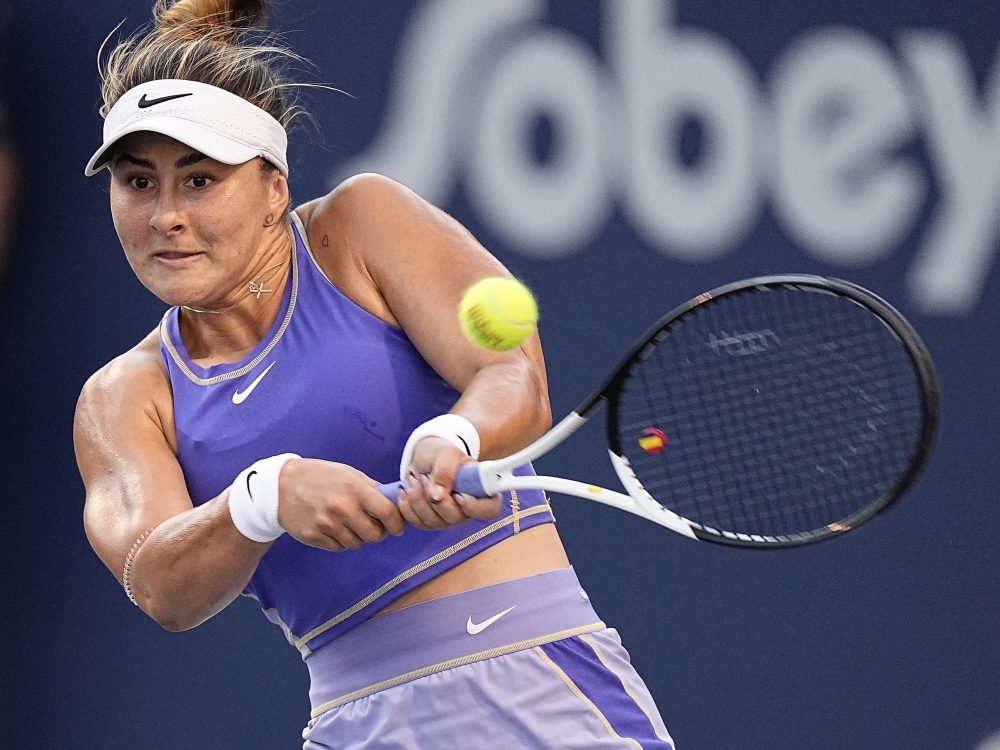 Bianca Andreescu (CAN) hits a backhand to Qinwen Zheng (not pictured) during third round play of the National Bank Open at Sobeys Stadium. Mandatory Credit: John E. Sokolowski-USA TODAY Sports