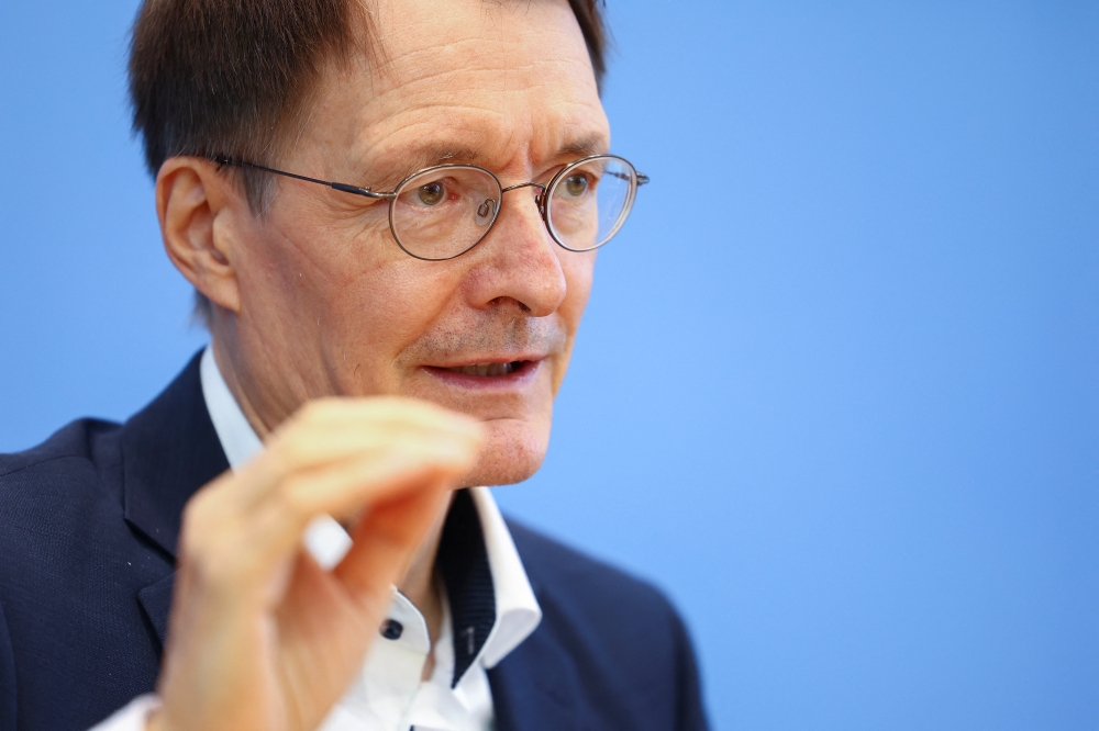 German Health Minister Karl Lauterbach speaks about the strategy against the coronavirus disease (COVID-19) pandemic during a news conference in Berlin, Germany, August 12, 2022. REUTERS/Lisi Niesner