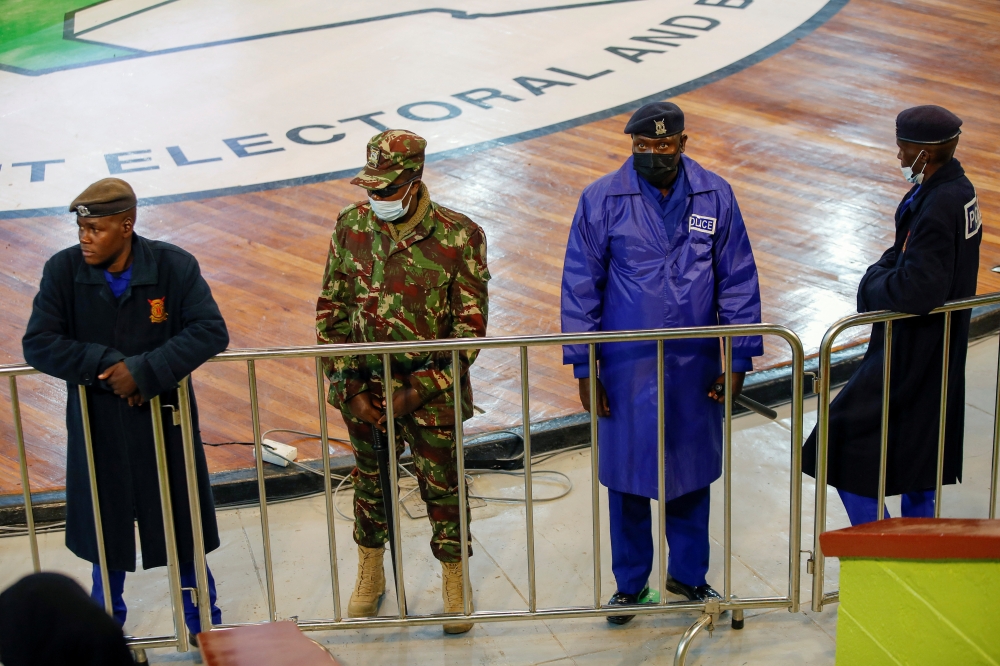 Members of security stand at the IEBC National Tallying Centre at the Bomas of Kenya, in Nairobi, Kenya, August 15, 2022. Reuters/Monicah Mwangi