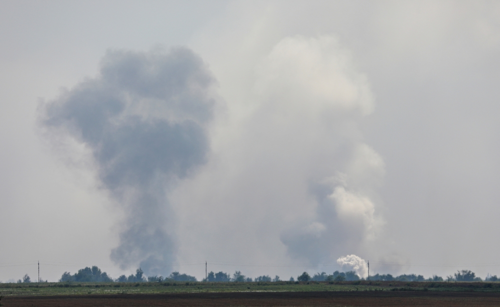 A view shows smoke rising above the area following an alleged explosion in the village of Mayskoye in the Dzhankoi district, Crimea, August 16, 2022. Reuters/Stringer