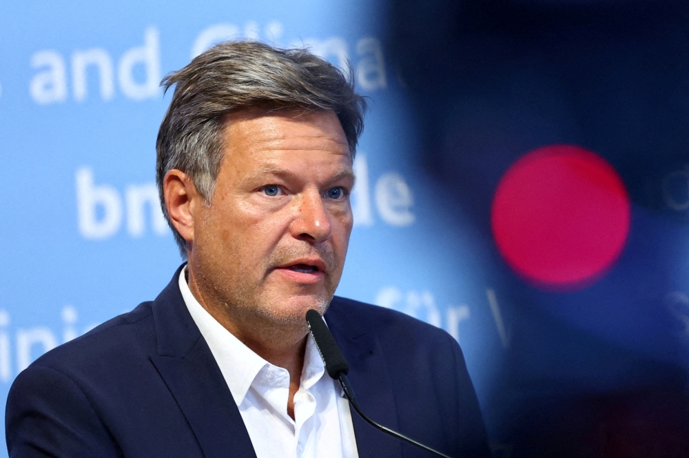 FILE PHOTO: German Economy and Climate Action Minister Robert Habeck speaks during a news conference on the future use of liquefied natural gas (LNG), in Berlin, Germany August 16, 2022. REUTERS/Lisi Niesner/File Photo