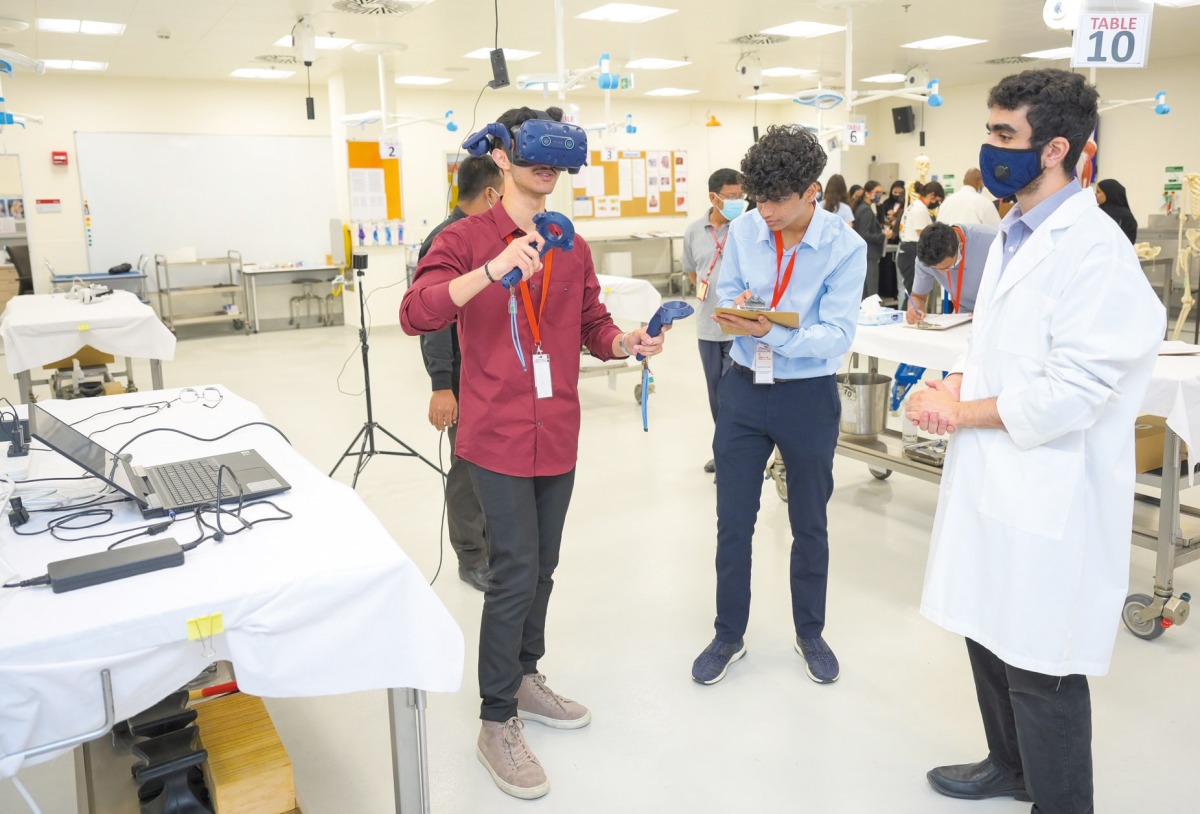 High school students take part in an activity during a summer programme at Weill Cornell Medicine-Qatar. 