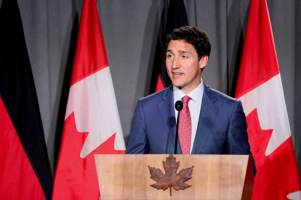 Canada's Prime Minister Justin Trudeau speaks during an official dinner at the Royal Ontario Museum in Toronto, Ontario, on August 22, 2022. REUTERS/Carlos Osorio
