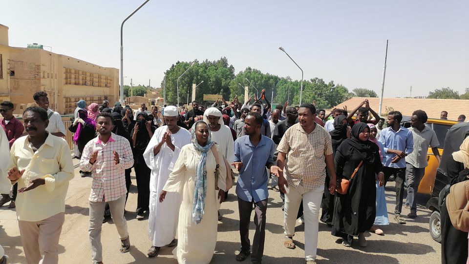 Sudanese demonstrators march and chant during a protest against the military takeover, in Atbara, Sudan, on October 27, 2021.  File Photo / Reuters