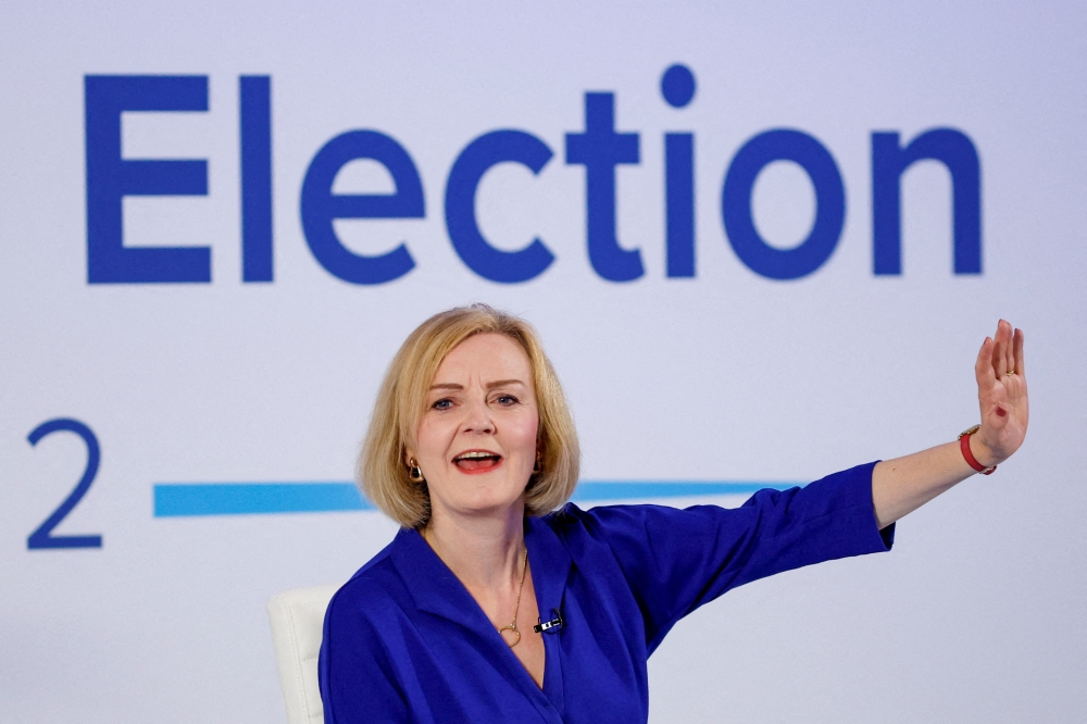 Conservative leadership candidate Liz Truss answers questions at a hustings event, part of the Conservative party leadership campaign, in Norwich, Britain, on August 25, 2022. REUTERS/John Sibley/File Photo