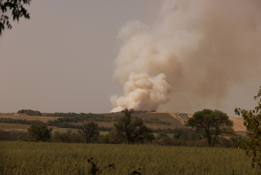 Smoke rises following recent Russian shelling, as Russia's attack in Ukraine continues, in Pazeno area, in Donetsk region, Ukraine August 28,2022. REUTERS/Ammar Awad
