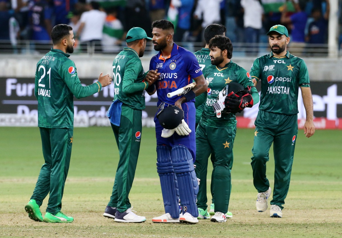 India’s Hardik Pandya shakes hands with Pakistan players after the match. 