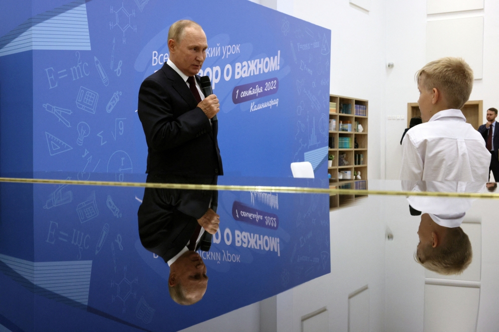 Russian President Vladimir Putin conducts an open lesson on Knowledge Day in Kaliningrad, Russia, September 1, 2022. (Sputnik/Gavriil Grigorov via Reuters)