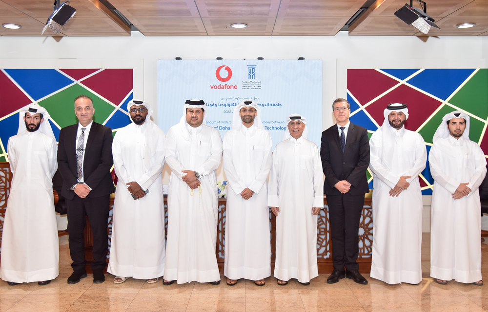 UDST President Dr. Salem Al Naemi (fourth right); Chief Human Resources Officer, Vodafone, Khames Mohammed Al Naimi (fifth right); and others at the MoU signing ceremony. 

