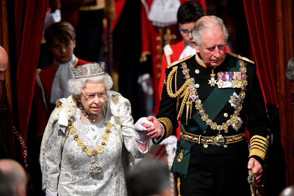 Britain's Queen Elizabeth arrives at the State Opening of Parliament with Charles, Prince of Wales, in London, on October 14, 2019.  File Photo/Reuters
