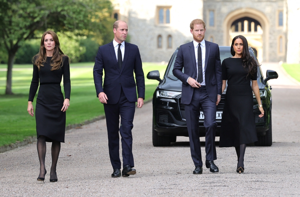 Britain's William, Prince of Wales, Catherine, Princess of Wales, Britain's Prince Harry and Meghan, the Duchess of Sussex on the long walk at Windsor Castle, following the passing of Britain's Queen Elizabeth, in Windsor, Britain, on September 10, 2022. Chris Jackson/Pool via REUTERS