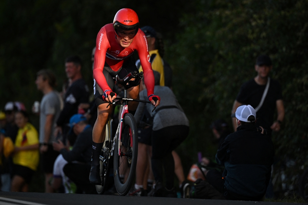 Tobias Foss of Norway competes in the Men’s elite time trial during the first day of UCI Road World Championships in Wollongong, Australia, Sunday, September 18, 2022. AAP Image/Dean Lewins via REUTERS