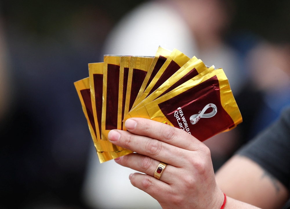 A street seller offers soccer World Cup stickers for sale at Parque Rivadavia in Buenos Aires, Argentina, on September 18, 2022. (REUTERS/Agustin Marcarian)