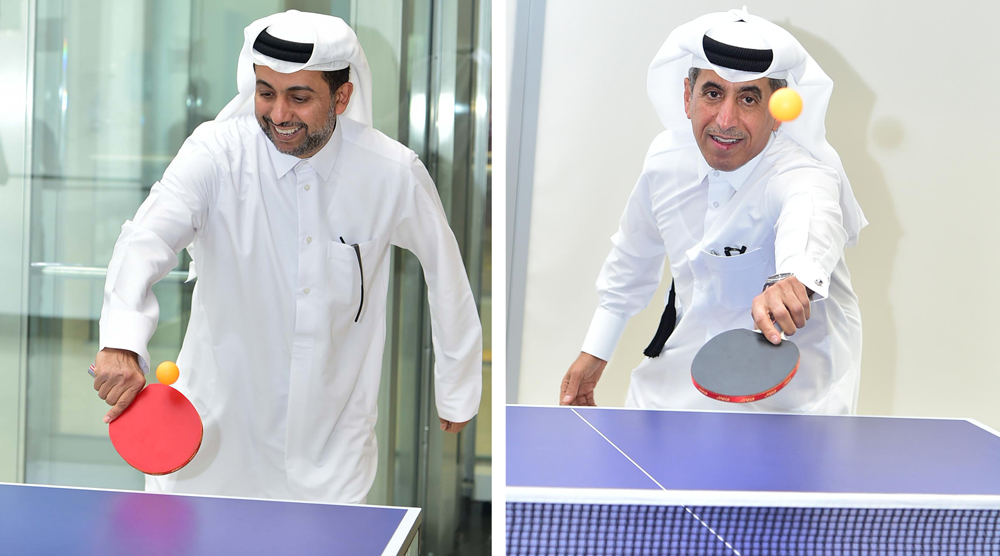 Qatar University President Dr. Hassan Rashid Al Derham and QU Sports Federation President Dr. Ibrahim Al Nuaimi play table tennis at the event.
