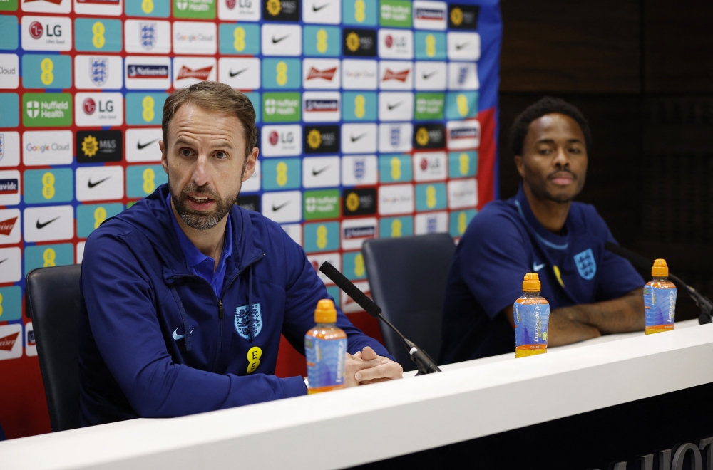 England manager Gareth Southgate and Raheem Sterling during a press conference at the Tottenham Hotspur Training Ground in London on September 25, 2022.  Action Images via Reuters/John Sibley
 
