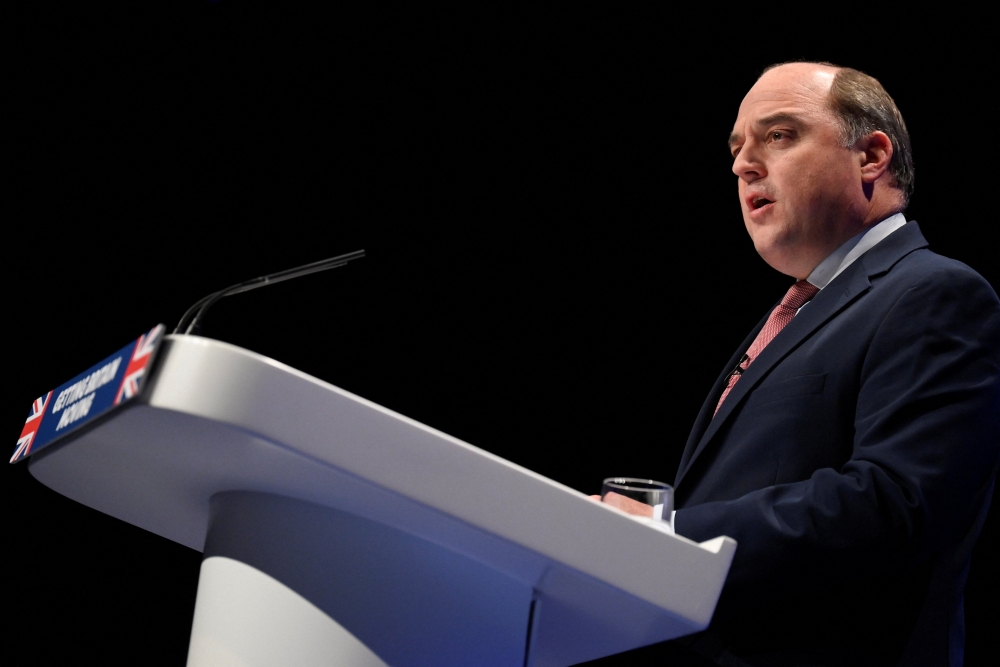 British Defense Minister Ben Wallace speaks during the annual Conservative Party conference in Birmingham, Britain, on October 2, 2022. (REUTERS/Toby Melville)