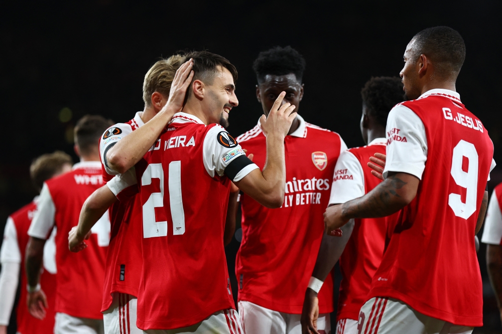 Arsenal's Fabio Vieira celebrates scoring their third goal with teammates during the Europa League match against Bodo/Glimt at the Emirates Stadium, London, Britain, on  October 6, 2022.  REUTERS/David Klein