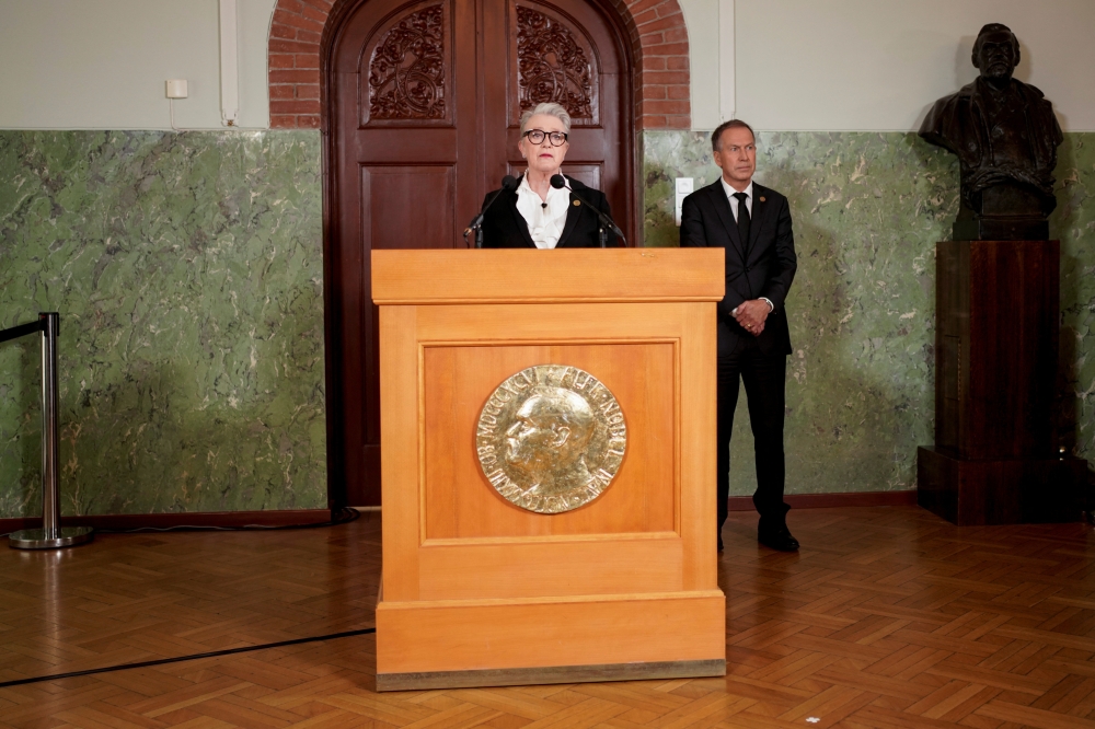 Berit Reiss-Andersen, head of the Nobel Committee, announces the winner of this year's peace prize laureate at the Nobel Institute in Oslo, Norway October 7, 2022. NTB/Heiko Junge via REUTERS