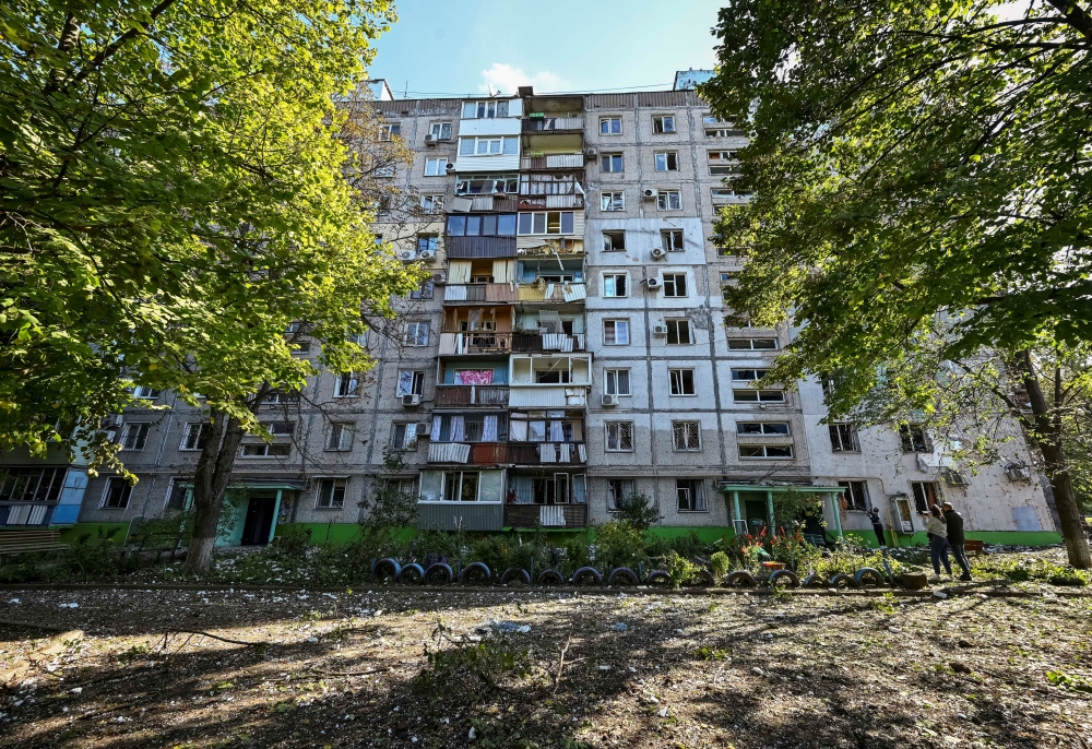 A view shows a building damaged by a Russian missile strike, amid their attack on Ukraine, in Zaporizhzhia, Ukraine, on October 7, 2022. REUTERS/Stringer