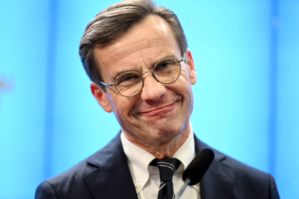 Sweden's Moderate Party leader Ulf Kristersson reacts, after being confirmed as new prime minister, in Stockholm, Sweden, October 17, 2022. (TT News Agency/Anders Wiklund via REUTERS)