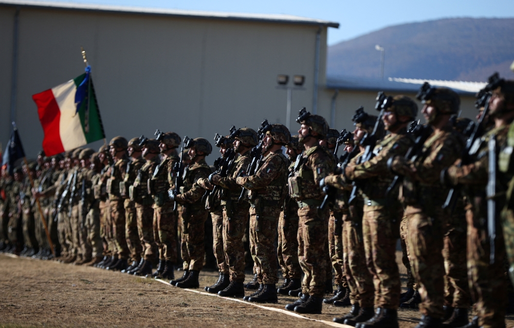 Italian soldiers take part in an official ceremony, as Italy takes the leadership over NATO's battle group in Bulgaria, at Novo Selo military grounds, Bulgaria, on October 17, 2022. REUTERS/Stoyan Nenov