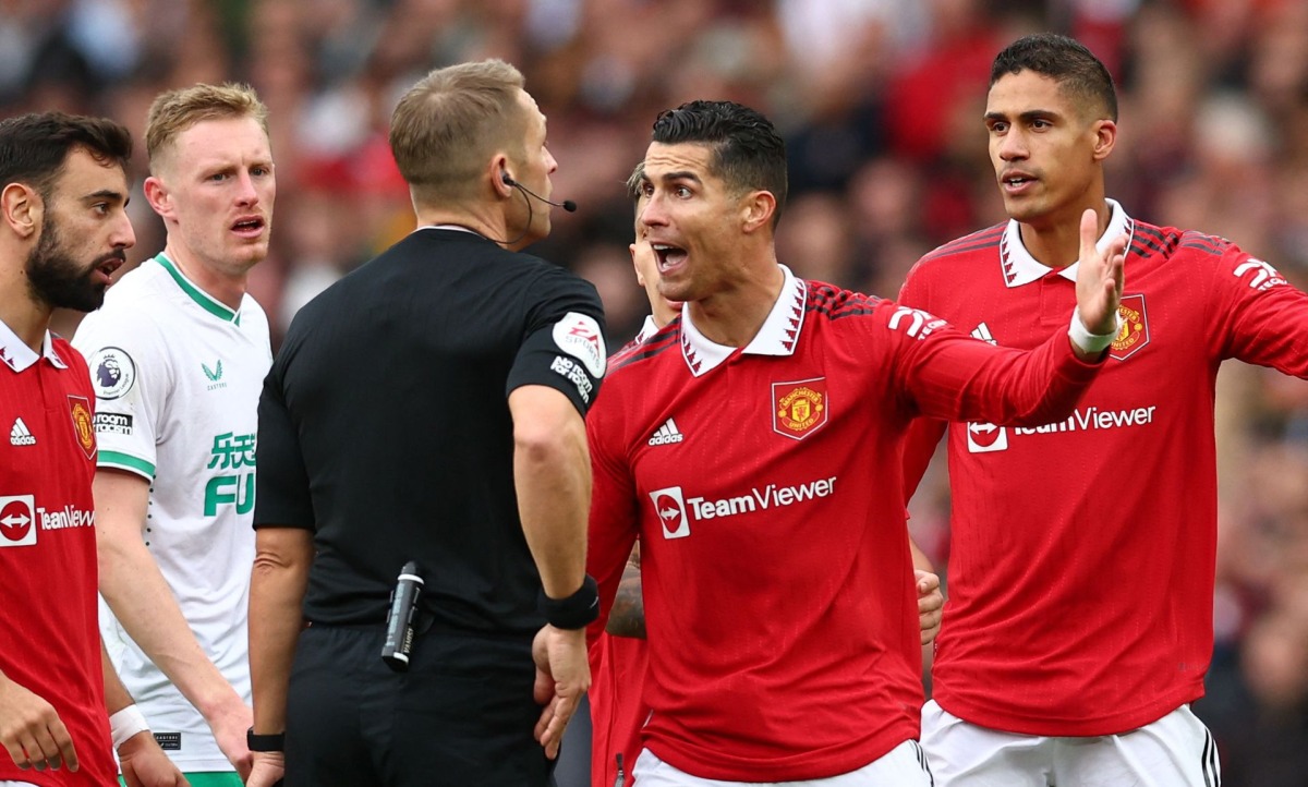 Manchester United's Cristiano Ronaldo reacts before he is shown a yellow card by referee Craig Pawson at the Premier League - Manchester United v Newcastle United, Old Trafford, Manchester, Britain, October 16, 2022. (REUTERS/David Klein)