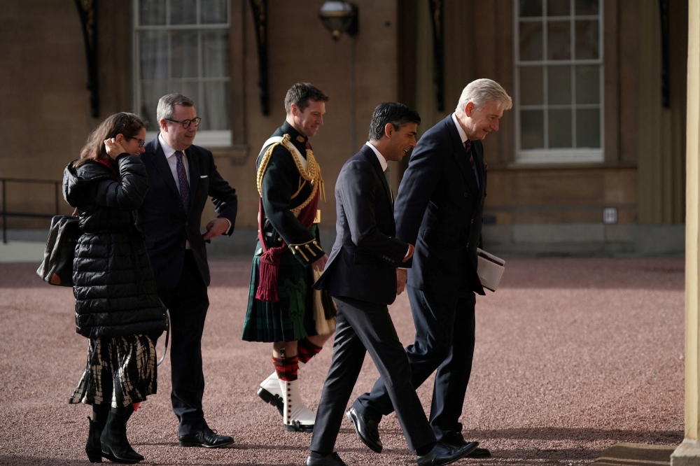 Newly elected leader of the Conservative Party Rishi Sunak, arrives at Buckingham Palace, London, for an audience with King Charles III. Yui Mok/Pool via Reuters