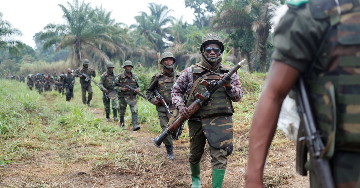 Congolese soldiers from the Armed Forces of the Democratic Republic of Congo (FARDC) walk in line after the army took over an ADF rebel camp, near the town of Kimbau, North Kivu Province, Democratic Republic of Congo, on February 20, 2018. File Photo / Reuters