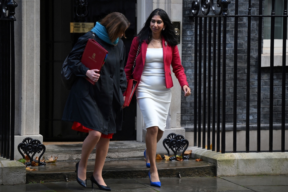 Britain's Education Secretary Gillian Keegan (left) and Britain's Home Secretary Suella Braverman leave after attending a Cabinet meeting at 10 Downing Street in central London on November 1, 2022. (Photo by Daniel LEAL / AFP)