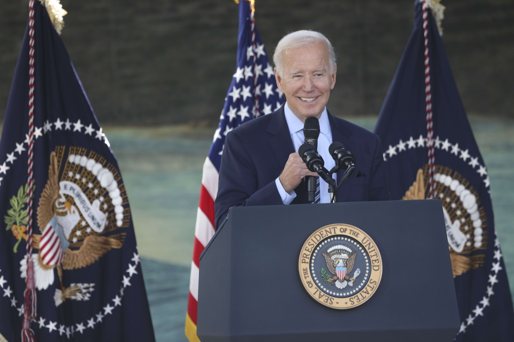 US President Joe Biden speaks with dignitaries and employees at ViaSat on November 4, 2022 in Carlsbad, California. Sandy Huffaker/Getty Images/AFP