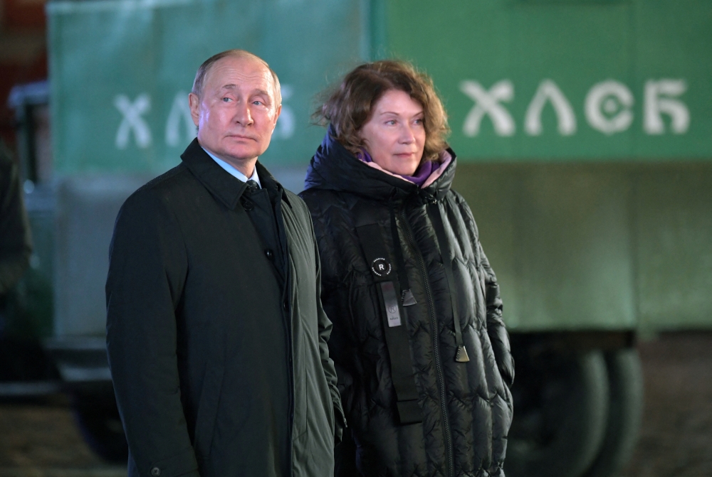 Russian President Vladimir Putin attends an exhibition marking the anniversary of a historical parade in 1941, when Soviet soldiers marched towards the front lines during World War Two, in Red Square in central Moscow, Russia, on November 8, 2022. Sputnik/Aleksey Nikolskyi/Kremlin via REUTERS