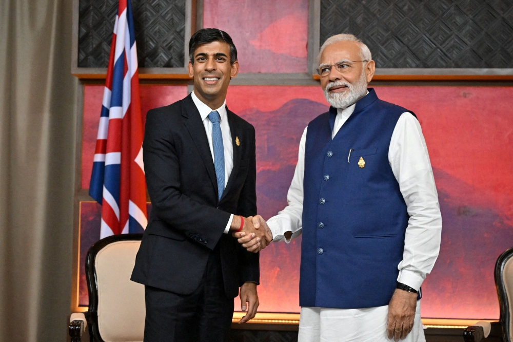 British Prime Minister Rishi Sunak and India's Prime Minister Narendra Modi hold a bilateral meeting on November 16, 2022 in Nusa Dua, Indonesia. Leon Neal/Pool via Reuters