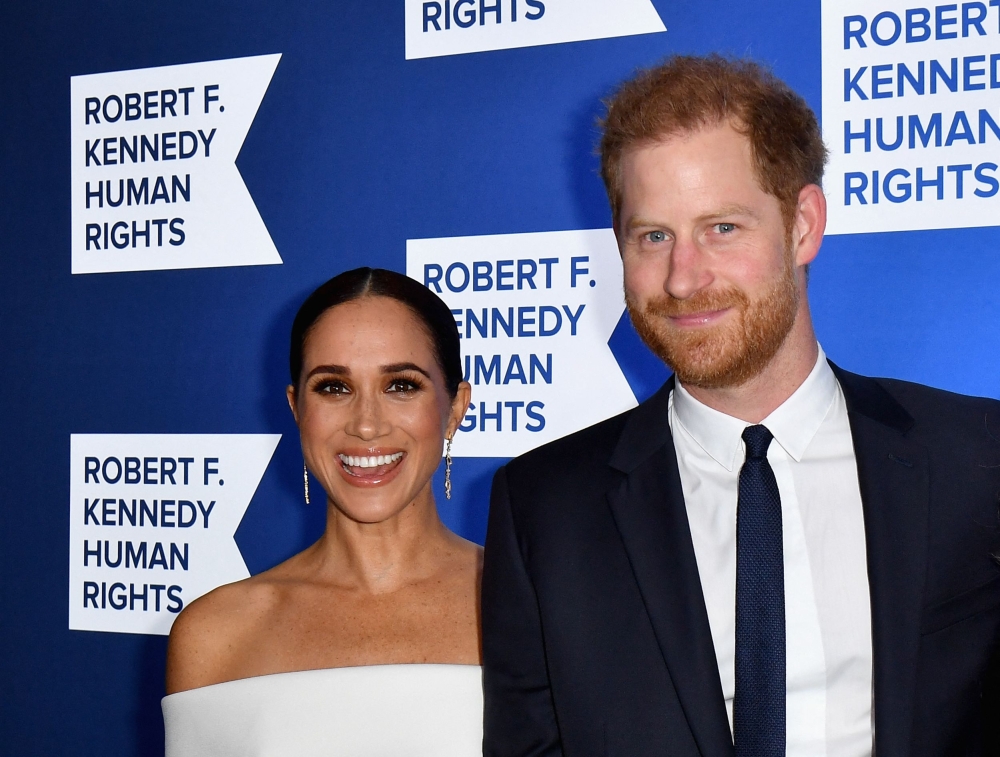 Prince Harry, Duke of Sussex, and Meghan, Duchess of Sussex, arrive at the 2022 Robert F. Kennedy Human Rights Ripple of Hope Award Gala at the Hilton Midtown in New York on December 6, 2022. (Photo by ANGELA WEISS / AFP)