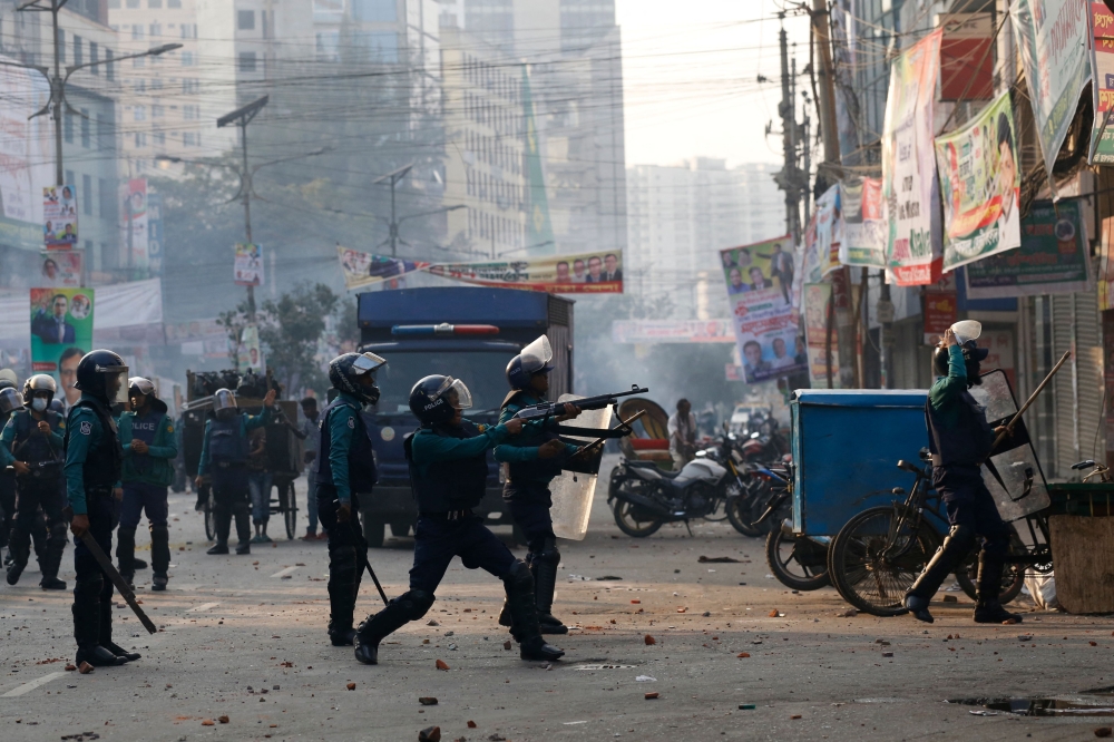 Police fire tear gas to disperse Bangladesh Nationalist Party (BNP) activists gathered in front of the party's central office in Dhaka on December 7, 2022. Photo by Rehman Asad / AFP