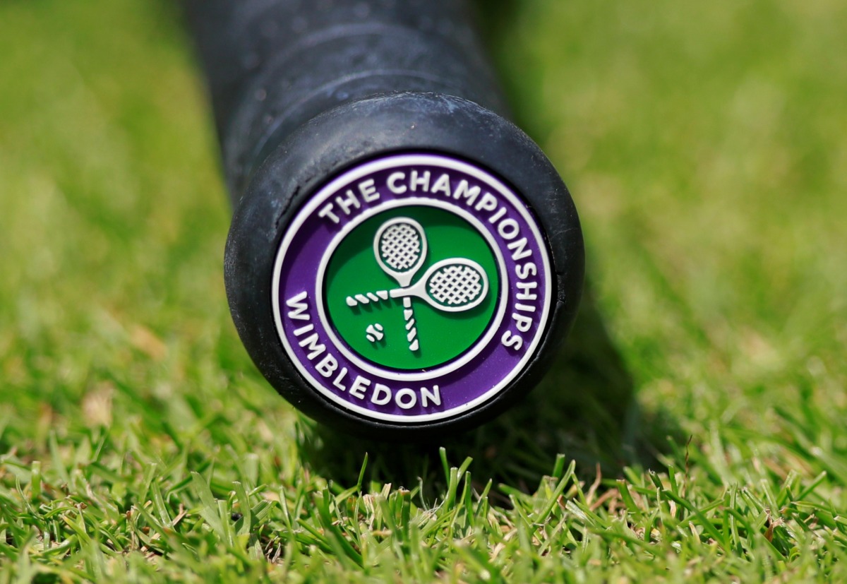 General view of the Wimbledon logo on the base of the handle of a tennis racquet at the All England Lawn Tennis and Croquet Club, London, Britain, on July 2, 2019.  File Photo / Reuters
