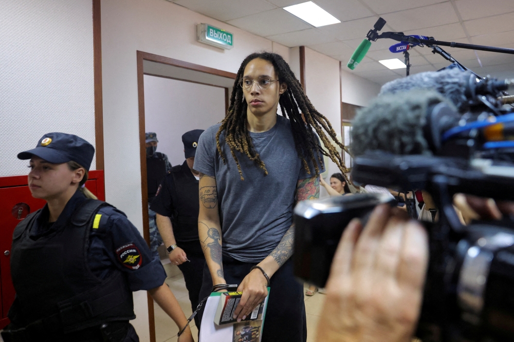 File Photo: US basketball player Brittney Griner is escorted before the verdict in Khimki outside Moscow, Russia, August 4, 2022. (REUTERS/Evgenia Novozhenina)