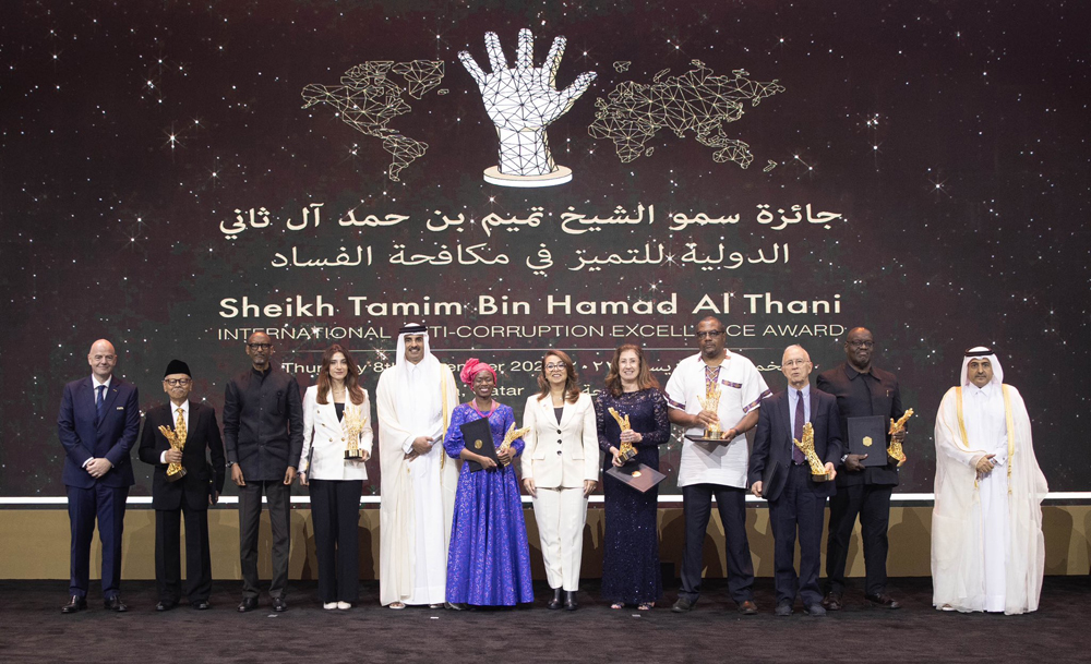 Amir H H Sheikh Tamim bin Hamad Al Thani with the winners of His Highness’s Sheikh Tamim Bin Hamad Al Thani International Anti-Corruption Excellence Awards and other officials at the award function yesterday.