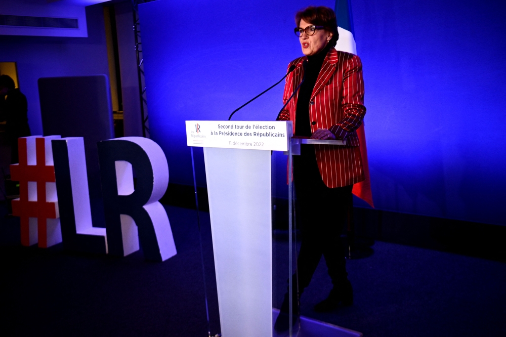 LR Party's temporary president Annie Genevard delivers a speech at the Les Republicains party headquarters in Paris on December 11, 2022, after the results of the second round of the LR presidency election. (Photo by Christophe ARCHAMBAULT / AFP)