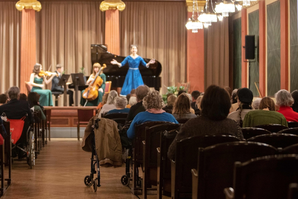 Spectators attend a concert specifically tailored to people living with dementia at the Wiener Musikverein in Vienna on December 5, 2022. Photo by Alex Halada / AFP