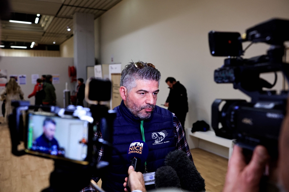 A plaintiff speaks to the press after the verdict of the trial of the Nice attack in Nice, southeastern France on December 13, 2022.  (Photo by Valery HACHE / AFP)