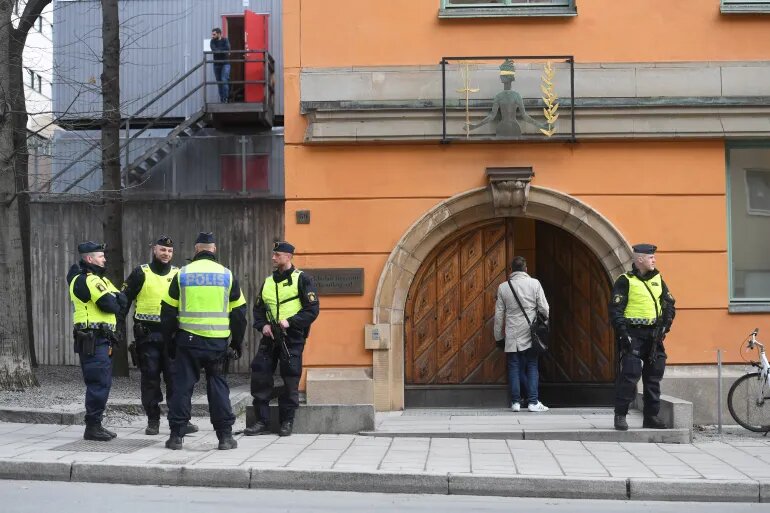 Police officers stand outside the Stockholm District Court on November 25, 2022. File Photo / Reuters
