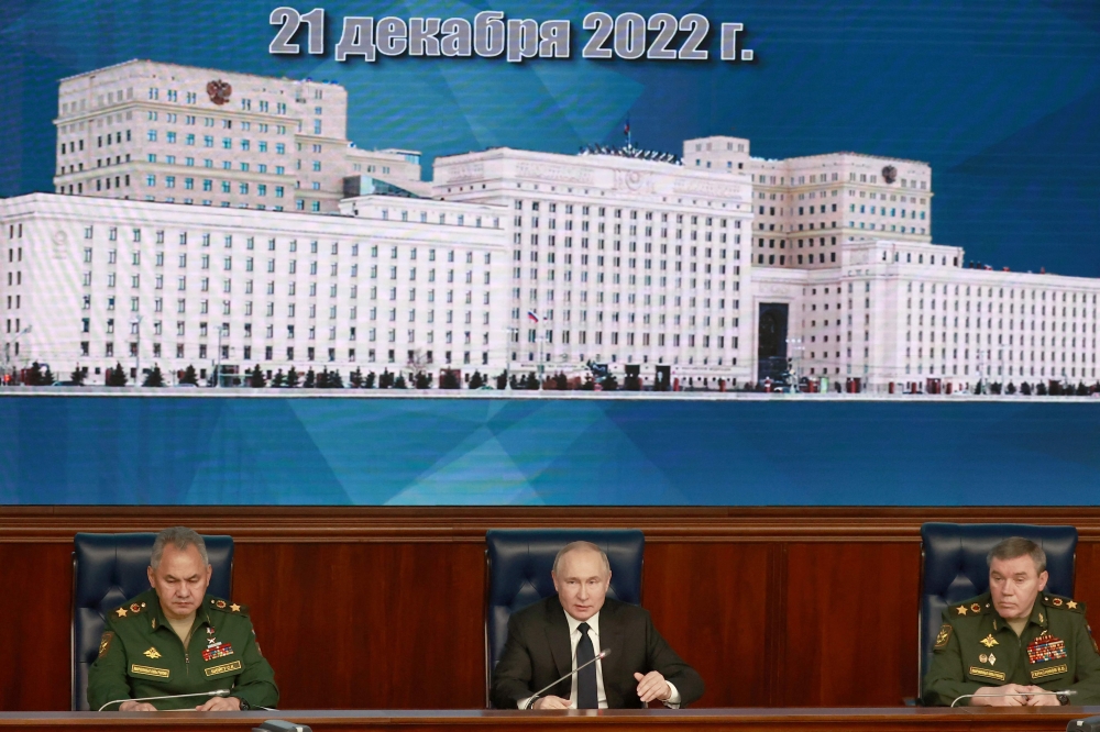 (From left) Defence Minister Sergei Shoigu, Russian President Vladimir Putin and Chief of the Russian General Staff Valery Gerasimov attend an expanded meeting of the Russian Defence Ministry Board at the National Defence Control Centre in Moscow, on December 21, 2022. (Photo by Sergey Fadeichev and Sergey FADEICHEV / Sputnik / AFP)