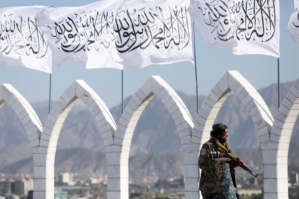 A Taliban fighter is seen at the Taliban flag-raising ceremony in Kabul, Afghanistan, on March 31, 2022.  File Photo / Reuters