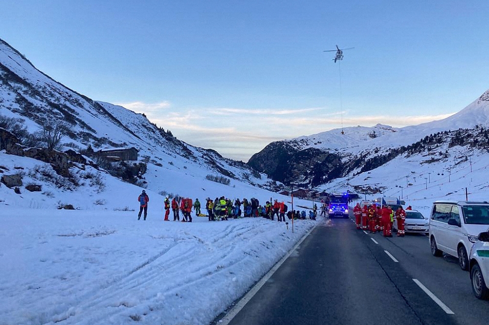 In this Handout photo made available by Lech Zuers Tourismus shows members of the emergency services working near the scene of an avalanche at Bregenz, Austria on December 25, 2022 - A 