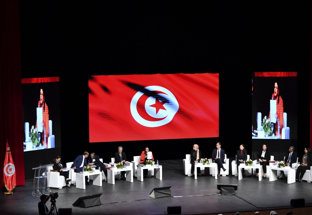 Tunisia's Finance Minister Sihem Boughdiri Nemsia presents the country's 2023 finance law during a press conference, in Tunis, on December 26, 2022. (Photo by Fethi Belaid / AFP)