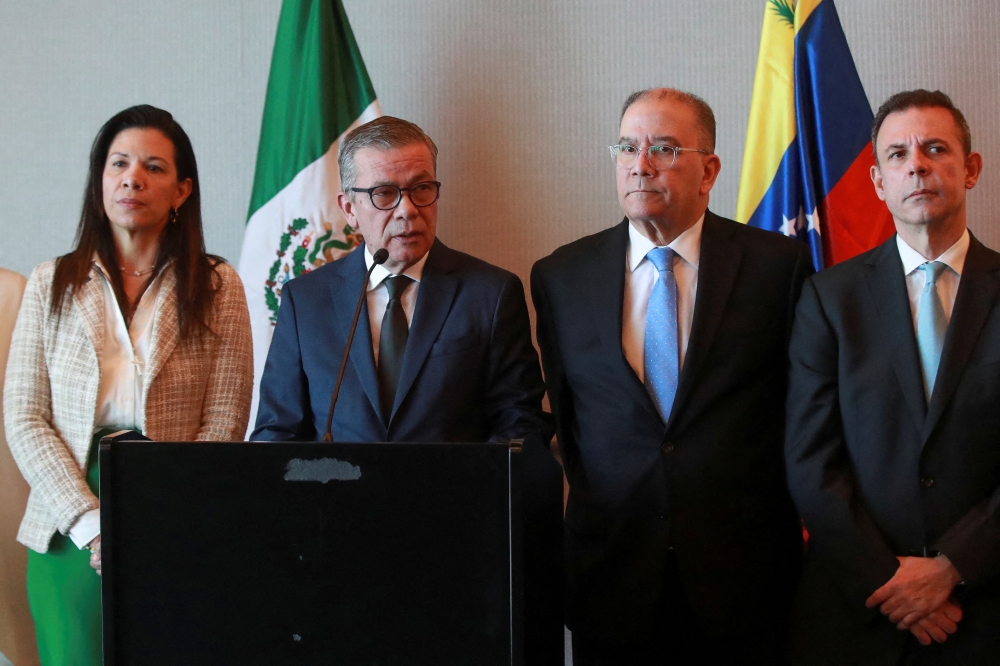 File photo: The head of the opposition delegation of Venezuela Gerardo Blyde Perez talks to the media accompanied by other delegates, in Mexico City, Mexico November 26, 2022. Reuters/Henry Romero/File Photo
