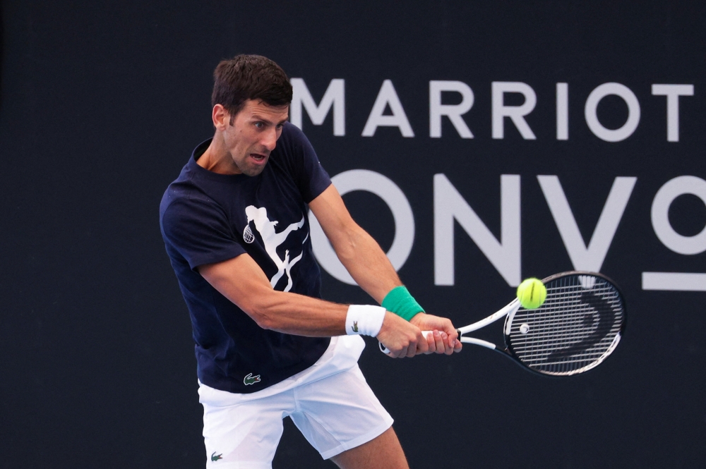 Serbia's Novak Djokovic practices ahead of the Adelaide International and Australian Open tournaments, at Memorial Drive Tennis Club in Adelaide, Australia, December 29, 2022. REUTERS/Loren Elliott