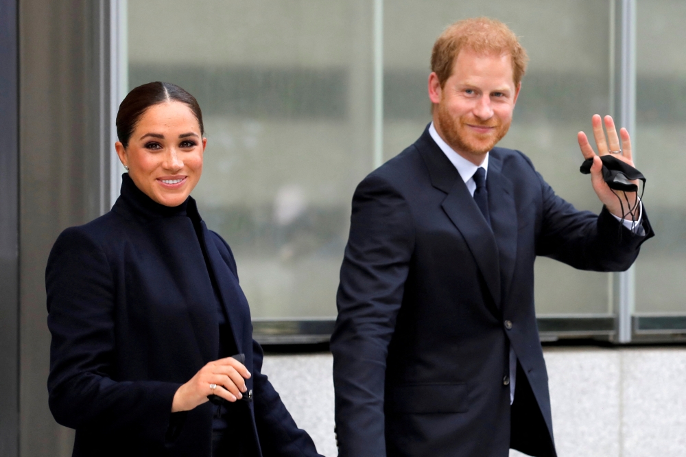 Britain's Prince Harry and Meghan, Duke and Duchess of Sussex, wave as they visit One World Trade Center in Manhattan, New York City, US, September 23, 2021. (REUTERS/Andrew Kelly)