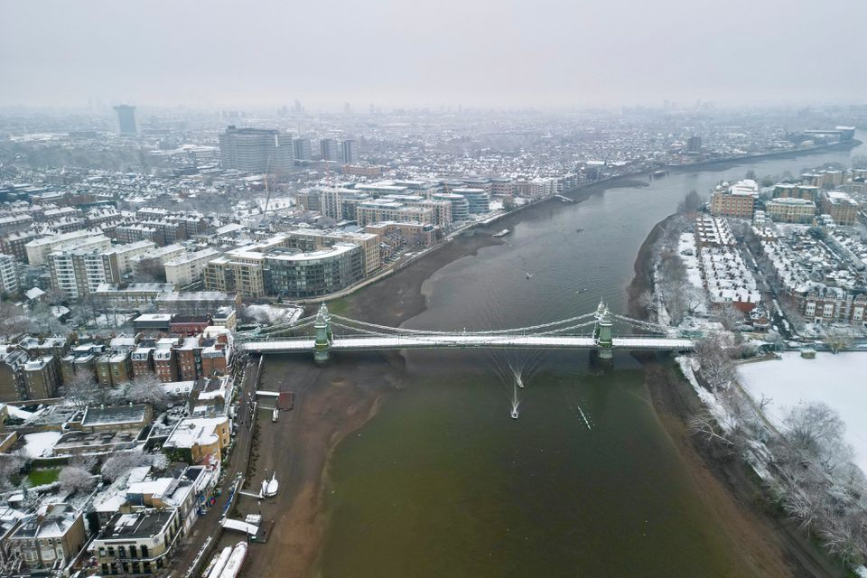 An aerial view of London, Britain, December 12, 2022 as the capital struggled with the aftermath of a heavy snowfall overnight. (REUTERS/Yann Tessier)